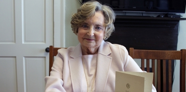 Sonja Curtis, shown in Ebenezer Hall on the Cochran Campus. She is wearing her mother's class ring and is surrounded by grade reports and other papers her mother kept from her days at Middle Georgia College in the late 1920s to 1930. From Sonja Curtis's earliest memories, the ring has loomed large in her life.  It’s a 14-karat gold class ring, worn smooth with age, that her mother, Ruth Monteen Cook, received in 1930 when she graduated from what many in Cochran and the surrounding communities apparently still referred to as New Ebenezer College, although by that time it had become Middle Georgia College.  “My mother lived on a farm in Roddy, about 10 miles outside of Cochran,” Curtis said. “She used to talk about driving to the campus in a Model T Ford and sometimes slipping and sliding on the muddy roads. She had a deep desire to get an education and to be constantly learning. She worked hard for that.”  Cook, who went on to establish a career in full-time and substitute teaching, wore the ring her entire adult life. She died in 1996 at the age of 86. Since then, Curtis has proudly worn the ring, inscribed on the head with the initials RMC, not only to honor her mother’s memory but to pay tribute to a historic college that is now part of Middle Georgia State University (MGA).  “This school has done so much for our family and for the community,” said Curtis, who herself attended Middle Georgia College in the 1960s.  In 1884, the New Ebenezer Baptist Association established New Ebenezer College, a junior college, in